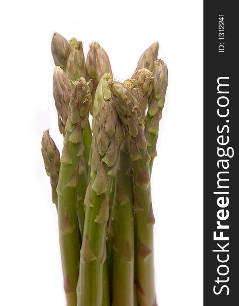 Asparagus spears on a white studio background. Asparagus spears on a white studio background.