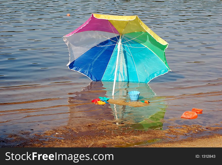 Beach Umbrella in the water. Beach Umbrella in the water