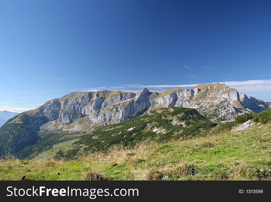 Hill in austria with blue sky in autumn. Hill in austria with blue sky in autumn