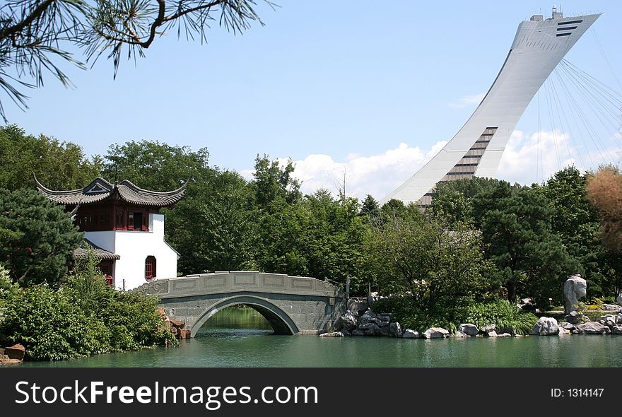 Botanical Gardens Montreal, Canada. Chinese garden lake and Pagoda with Biodome in background