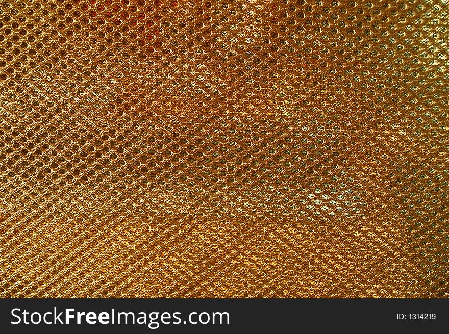 Close-up of golden metallic texture. Close-up of golden metallic texture