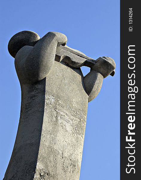 Statue of a man with violin in Budapest, Hungary