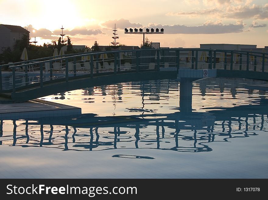 View of a swimming pool in the evening on Crete