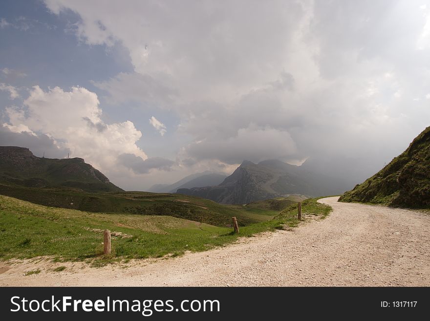 A mountain path with blue and green landscape. A mountain path with blue and green landscape