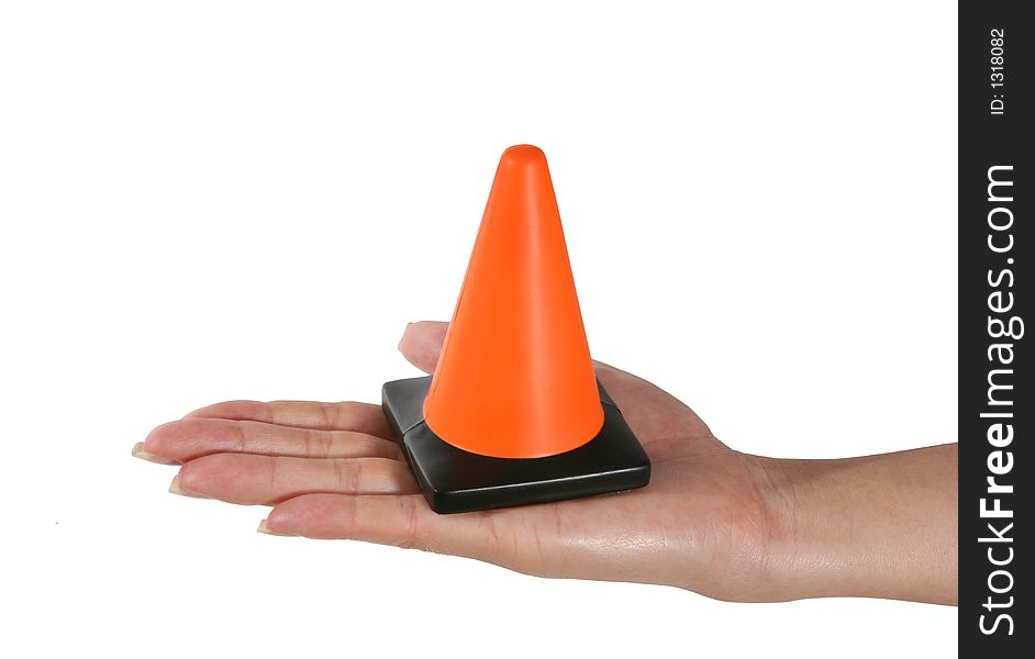 A woman holding a construction cone