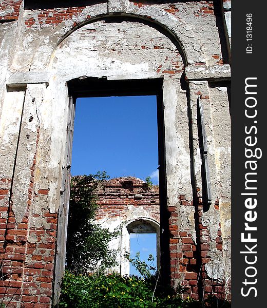 The view from the interior of the destroyed temple, a complex interesting structure of brick walls of a temple, a sky from a window. Russia, Vladimirskaya obl. The view from the interior of the destroyed temple, a complex interesting structure of brick walls of a temple, a sky from a window. Russia, Vladimirskaya obl.