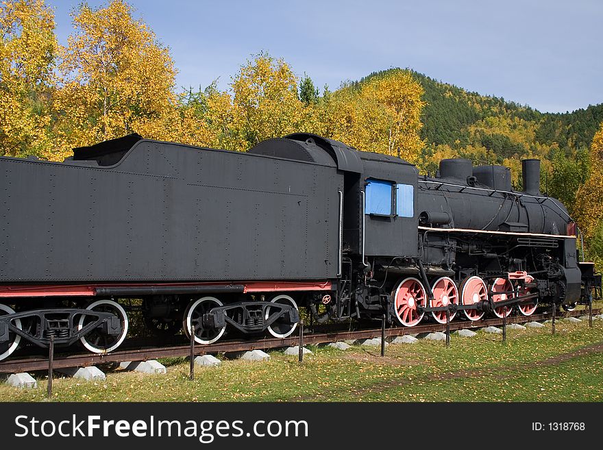 The steam locomotive with the coal car