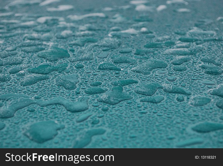 Frozen water bubbles on green background