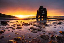 Is A Spectacular Rock In The Sea On The Northern Coast Of Iceland. Legends Say It Is A Petrified Troll. On This Photo Royalty Free Stock Images