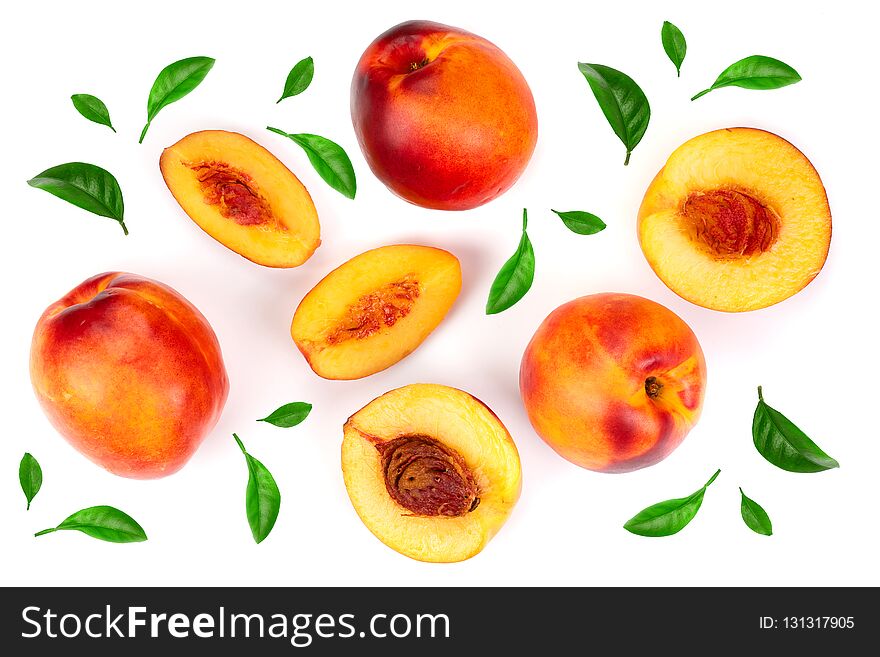 Ripe nectarine with leaves isolated on white background. Top view. Flat lay pattern.