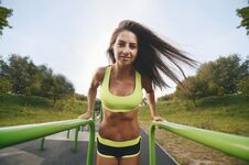Outdoor Sport Beautiful Strong Athletic Muscular Young Caucasian Fitness Woman Workout Training In The Gym On Diet Pumping Up Stock Photo