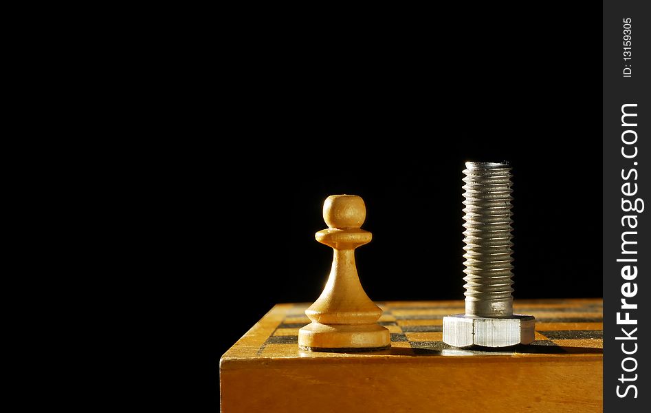 Chess figure and a bolt against black background. Chess figure and a bolt against black background