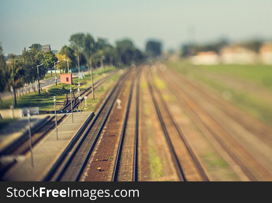 Railway station, rails and sleepers, blur. Railway station, rails and sleepers, blur