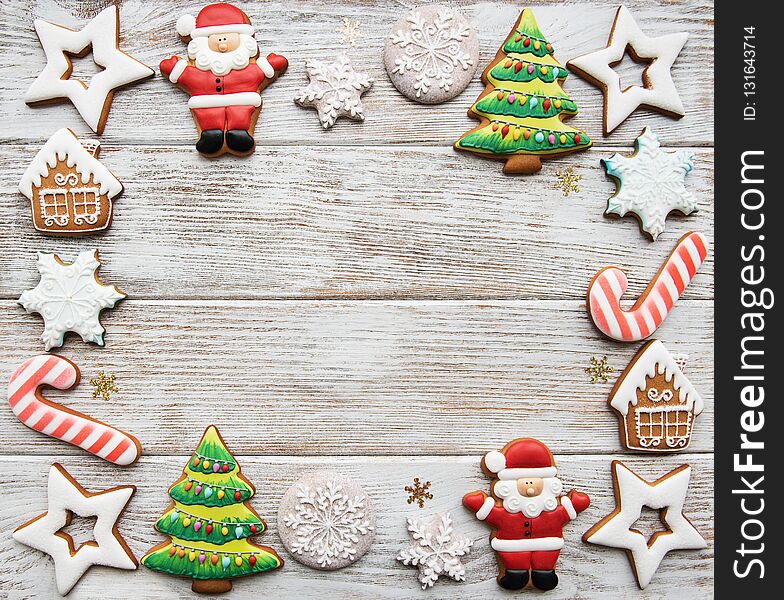 Christmas homemade gingerbread cookies on a old wooden background