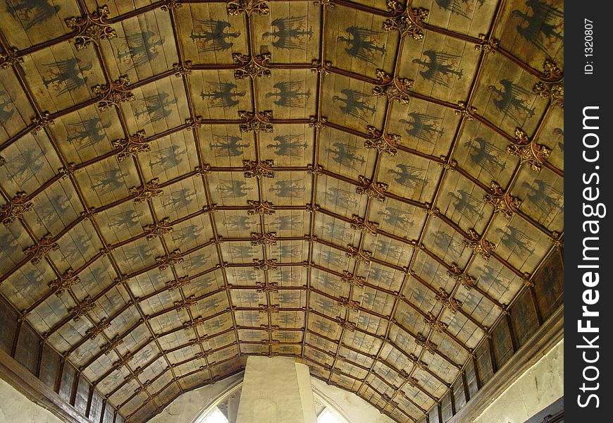 Medieval roof in Norwich Great Hospital emblazoned with heraldic eagles. Medieval roof in Norwich Great Hospital emblazoned with heraldic eagles