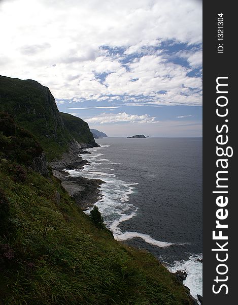 Ocean view from the lighthouse of Hendanes, westcoast of Norway. Breakers at the rocks. Ocean view from the lighthouse of Hendanes, westcoast of Norway. Breakers at the rocks