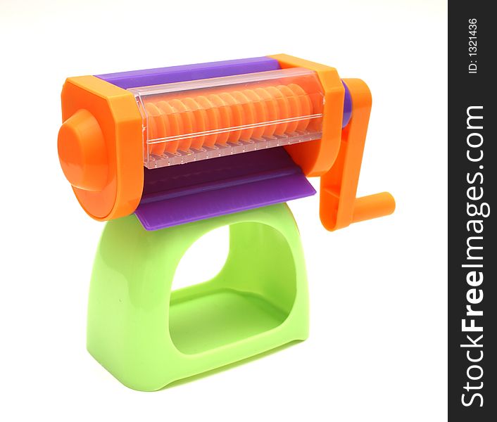 Plastic crank dough press toy isolation. Plastic crank dough press toy isolation