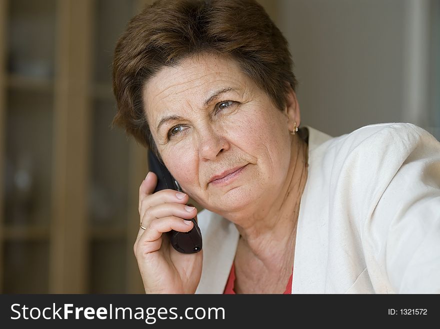 Businesswoman in the office on a phone