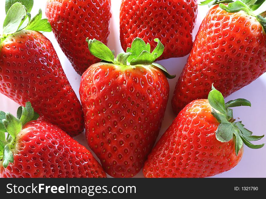 Strawberries compostion, few fruits on whire background. Strawberries compostion, few fruits on whire background