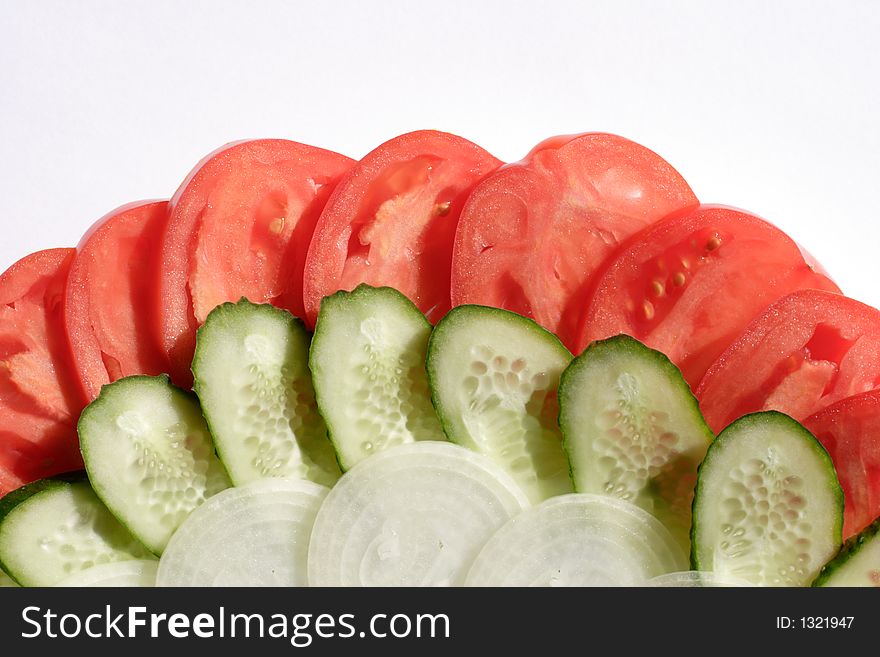 Salad from tomatoes, cucumbers, an onions
