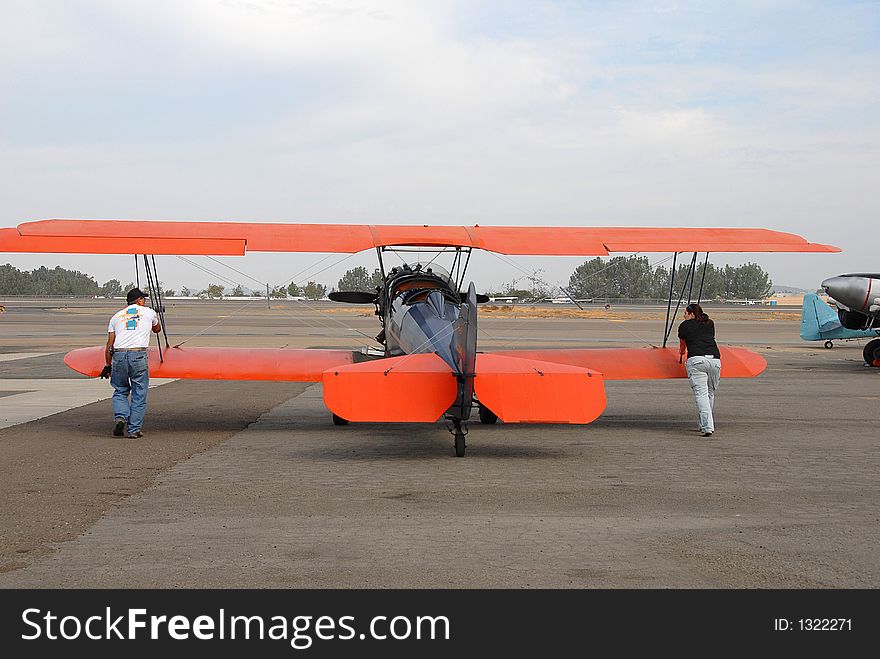 Pilots are moving plane, preparing it for a flight. Pilots are moving plane, preparing it for a flight