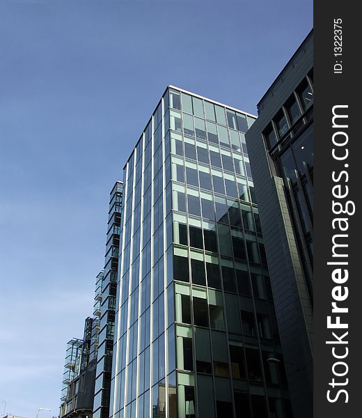A modern glass building in central London. A modern glass building in central London.