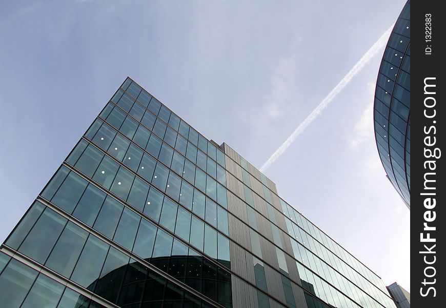 A modern glass building in central London. A modern glass building in central London.