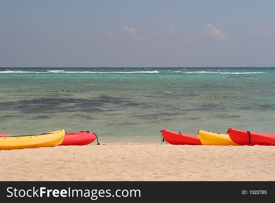 Beach, Ocean, Red and Yellow Kayaks