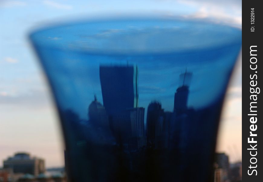 A distorted image of the boston skyline as seen through a blue glass. A distorted image of the boston skyline as seen through a blue glass
