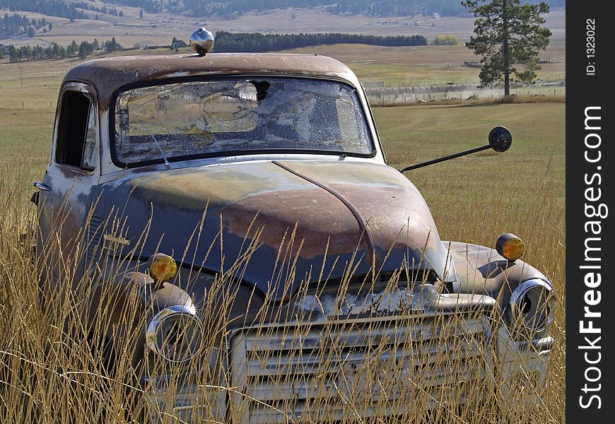 This image of the old rusted out truck abandoned in the field was taken in NW Montana. This image of the old rusted out truck abandoned in the field was taken in NW Montana.