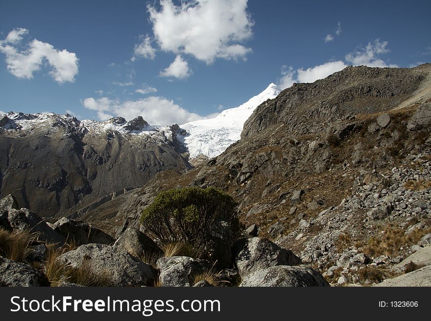 Rock and high snow mountain in Cordillera Blanca. Rock and high snow mountain in Cordillera Blanca