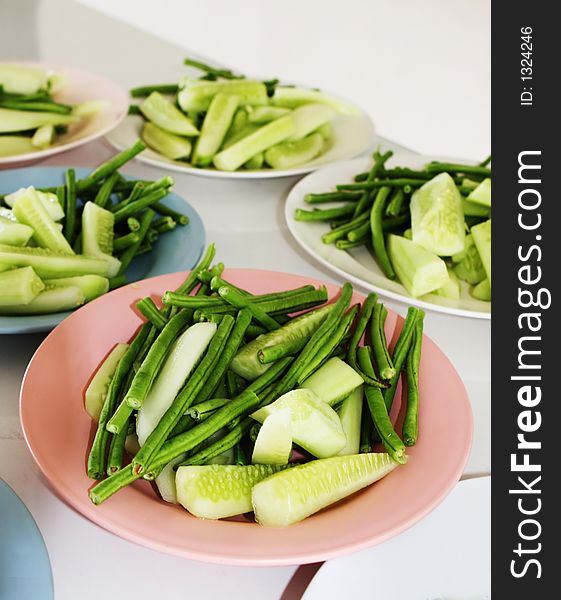 Plates of beans and cucumbers - healthy living