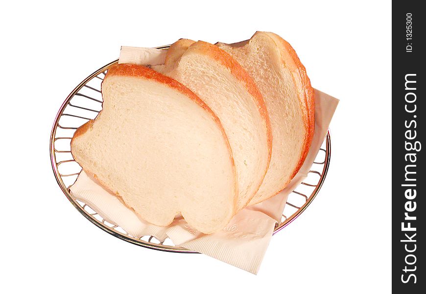 Fresh bread in a wire bowl. Fresh bread in a wire bowl