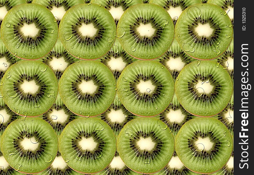 Fresh kiwi slices with water drops