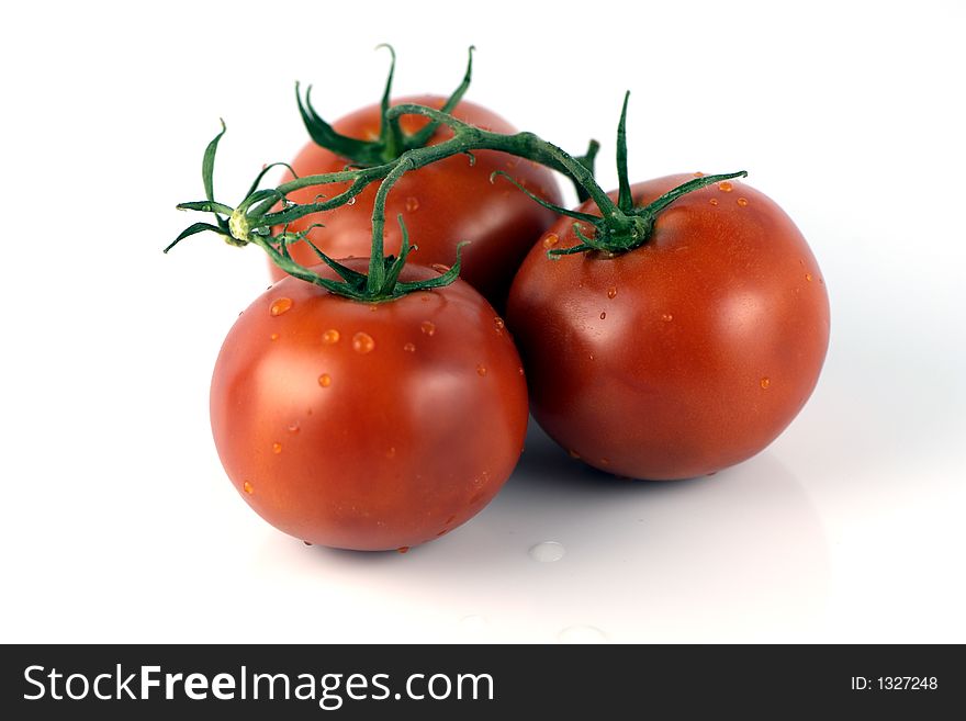 3 red tomatoes on white background