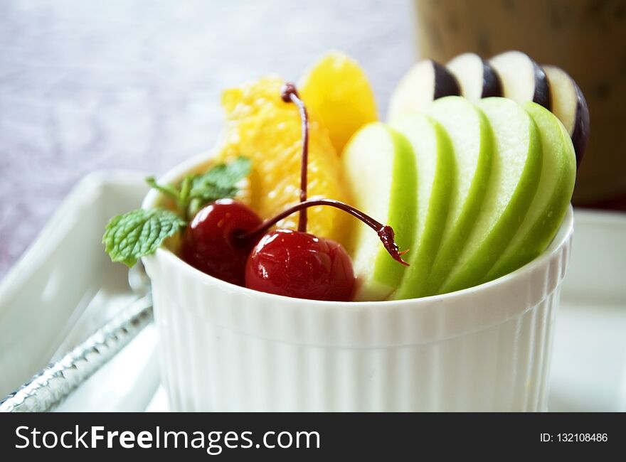 mixed fruit cheese cake in cup.