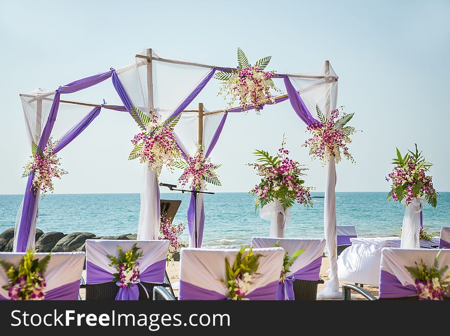 Wedding flowers setting on the beach.