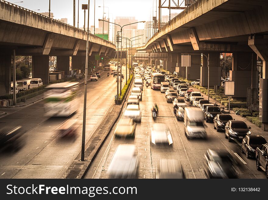 Traffic movement in rush hour of Bangkok highway at sunset