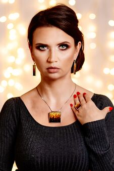 Young Attractive Woman Posing With Jewelry Necklace Stock Photo