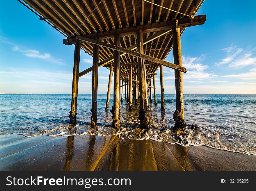 Malibu wooden pier seen from below, Los Angeles. Southern California, USA