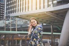 Portrait Beautiful Female With Positive Attitude Expressing Energy In Good Time,Woman Walking In The City,Happy And Smiling Royalty Free Stock Image