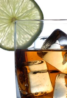 Drink With Slice Of Lime, Closeup On Ice Cubes Stock Photo