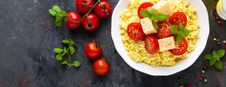 Millet Porridge With Tomatoes And Cheese Royalty Free Stock Image Millet Porridge With Tomatoes And Cheese Royalty Free Stock Image