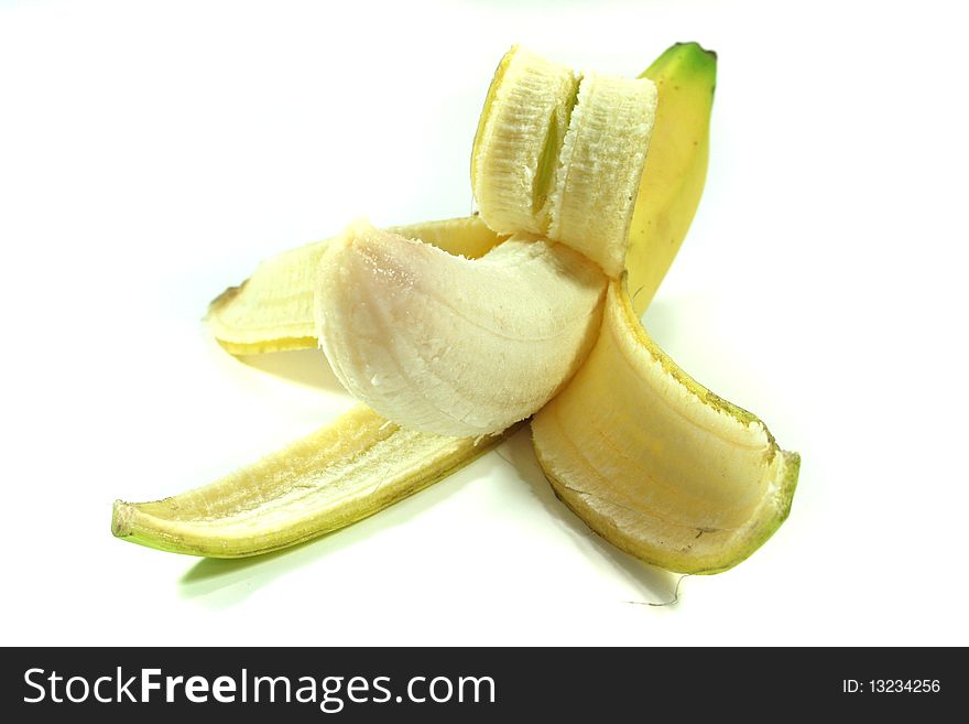 Peeled banana on a white background