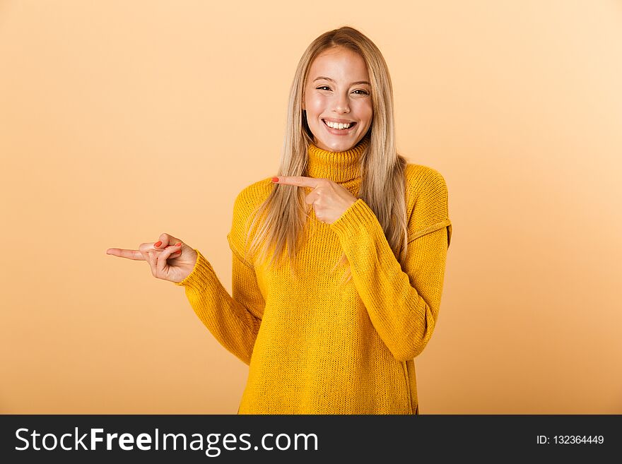Portrait of a lovely young woman dressed in sweater