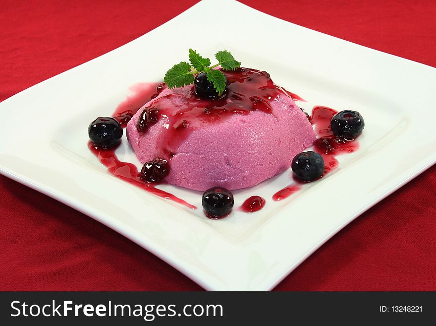 Blueberry dessert on a white plate