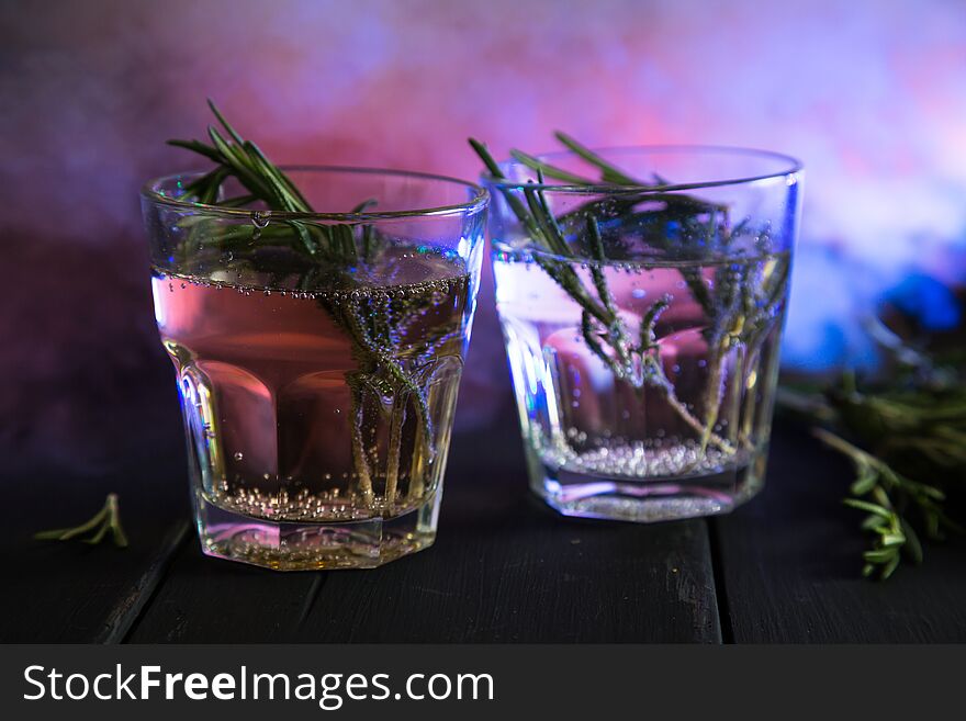 Mocktail on a background of smoke, on a dark background. Mocktail on a background of smoke, on a dark background