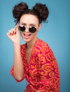 Colorful Studio Portrait Of Beautiful Young Woman Posing In Sunglasses. Big Smile Stock Photography
