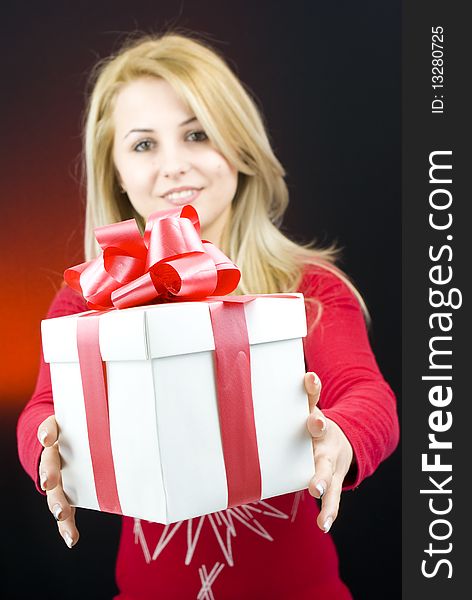 Woman with gift box in her hands. Woman with gift box in her hands