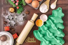 Christmas Baking Cake Background. Ingredients And Tools For Baking - Flour, Eggs, Silicone Molds In The Shape Of A Christmas Tree, Stock Photos